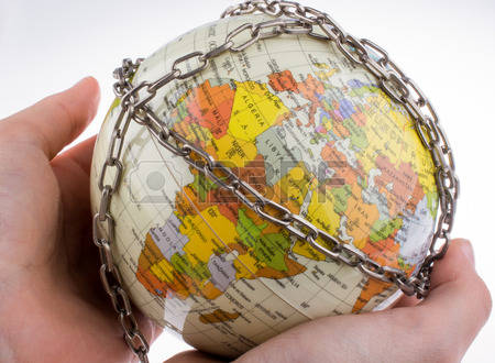 52074706-hand-holding-a-globe-in-chains